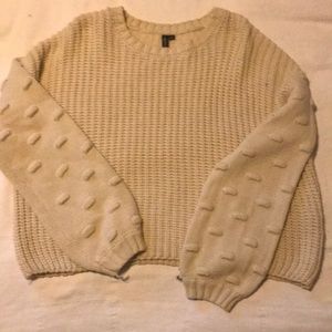 L cream sweater